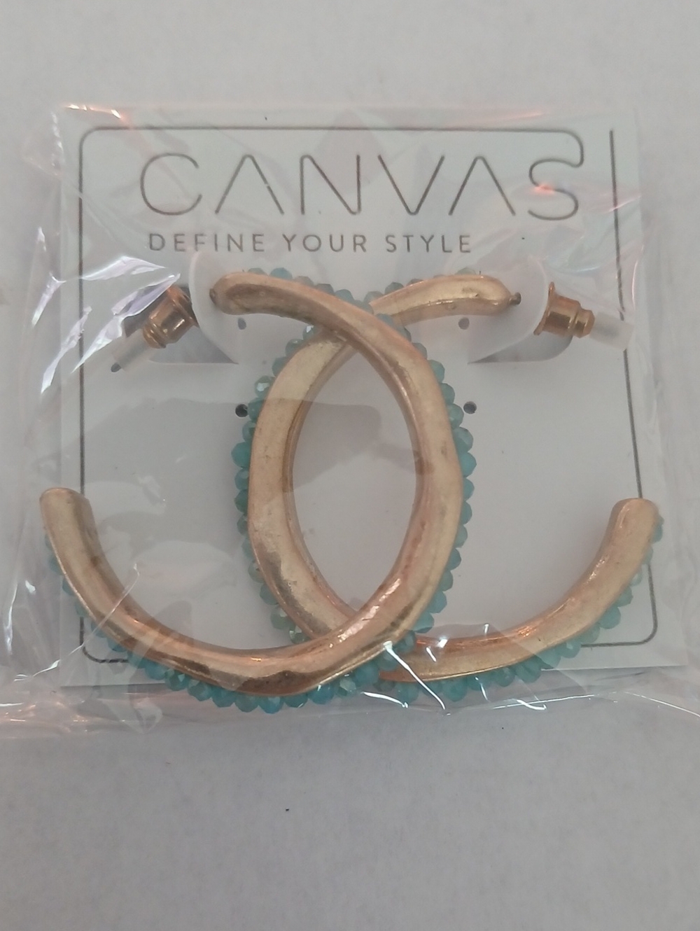 Canvas gold-tone open hoop earrings